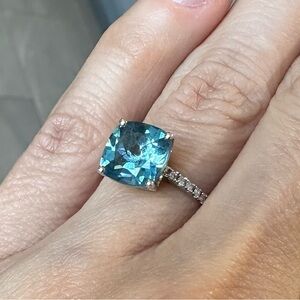 Aquamarine Cushion cut set in Sterling Silver w/ white gemstones